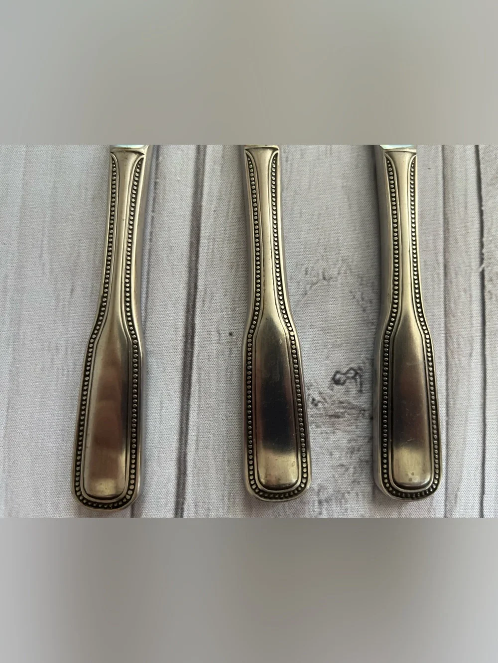 One set of 3 vintage Salem 1776 stainless steel beaded edge butter knives.